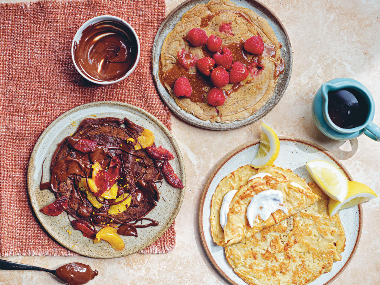 Close-up of plant-based chocolate orange pancakes served on a plate.