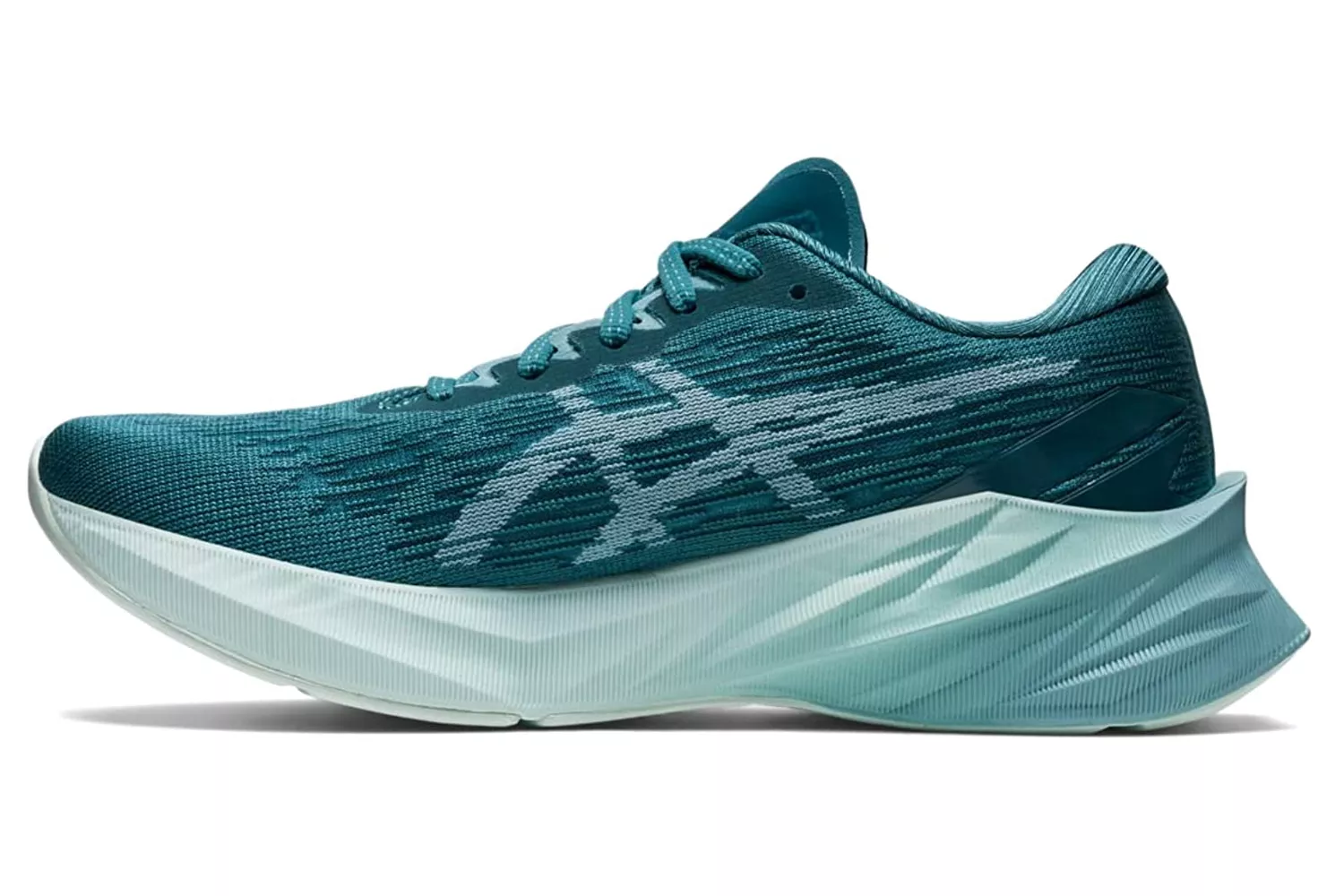 Teal ASICS NOVABLAST 3 running shoe with a thick, textured cushioned sole.