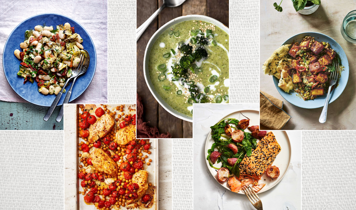 A top-down view of multiple healthy dishes including salads and cooked proteins.