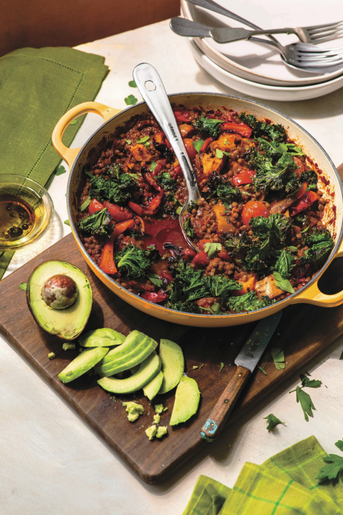 Close-up of harissa sweet potato and lentil stew showing the thick, creamy consistency.