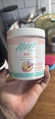 Alani Nu BCAA Sour Peach Rings source label used in the packaging illustration
