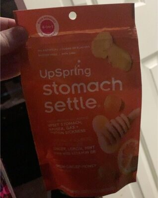 UpSpring Stomach Settle Drops Lemon-Ginger-Honey Flavored source label used in the packaging illustration